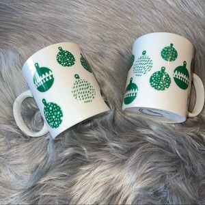 Starbucks holiday mugs with green ornaments